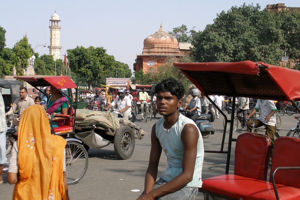 Auto rickshaw and street traffic in downtown Jaipur
