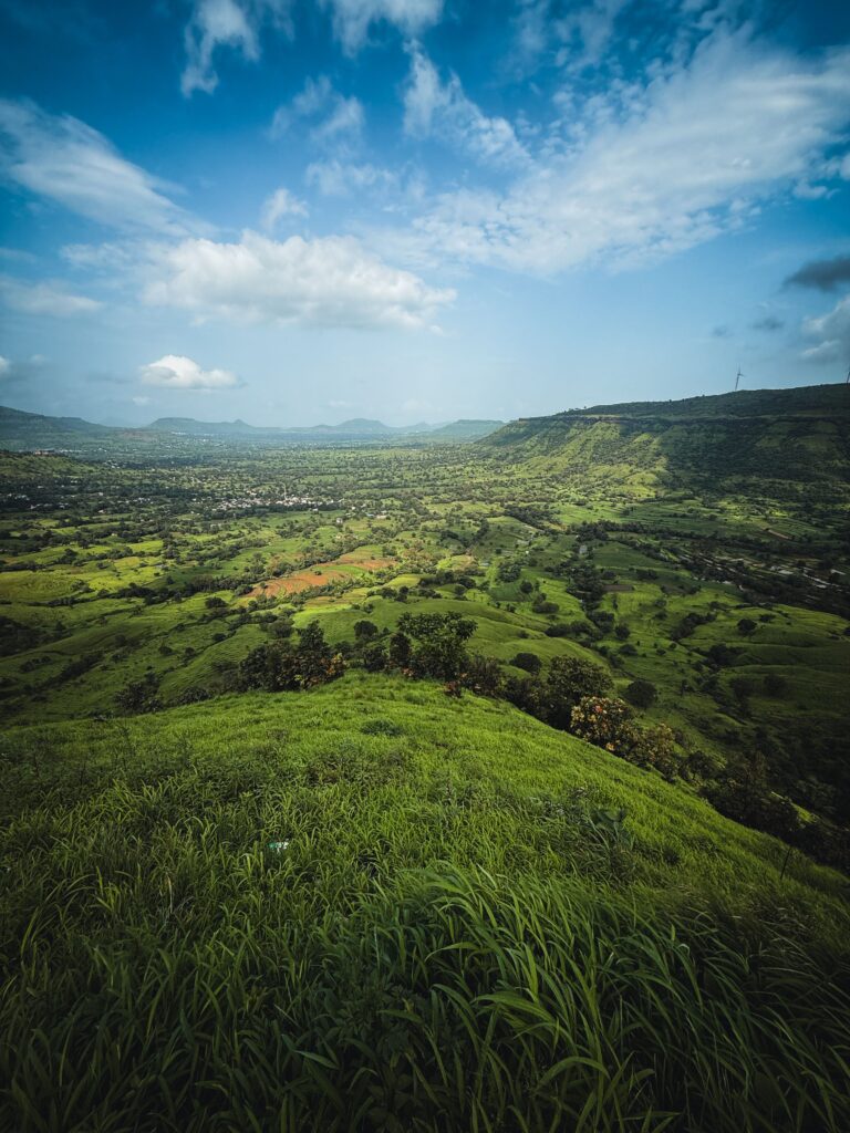 Green hills near Pune during monsoon picnic season.