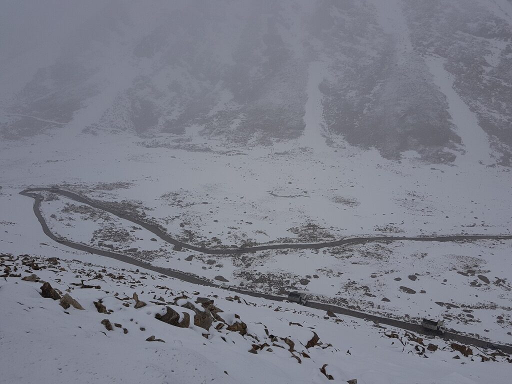 Snow-covered mountains on the road towards Chang La Pass in Ladakh