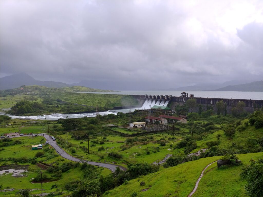Pawna Lake reservoir and surrounding green hills near Pune.”