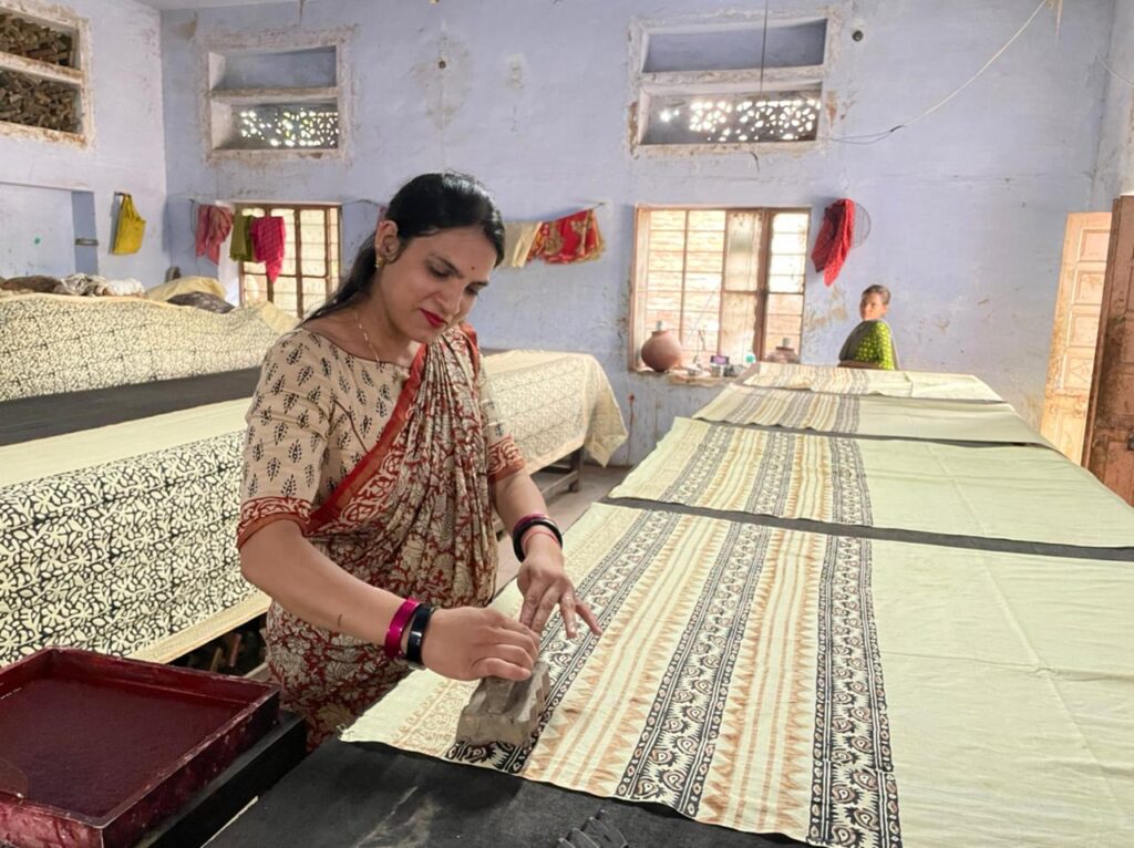 Artisan demonstrating hand block printing in Bagru near Jaipur